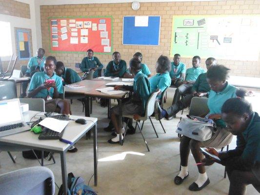 Zambia classroom discussing a math problem.