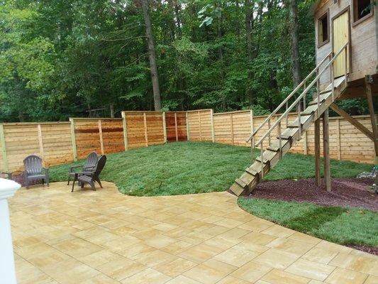 Cedar horizontal fence, grading, new patio, planting beds, irrigation