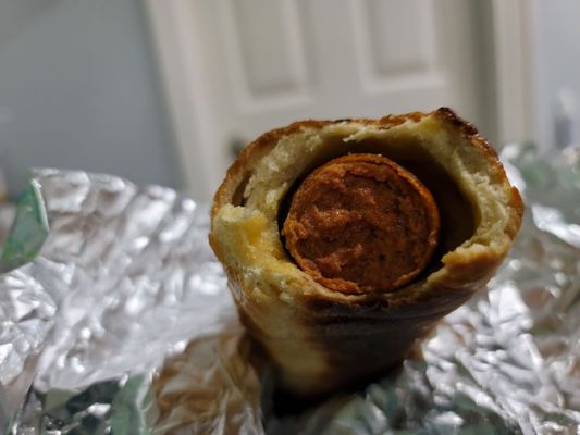 Inside of plain bagel dog. Whole beef hot dog. Meat & carbs go well together.