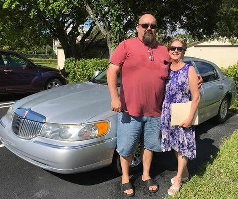 Happy Clients!! The love of the Beautiful Lincoln Town Car..