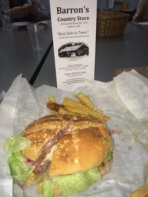 Turkey Burger with cheese, lettuce, tomato, pickles & cranberry mayo in a bulkie roll