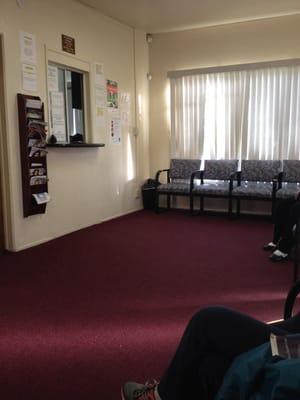 Waiting room. Chairs are pretty new and not gross and stained, but overall it's pretty dingy and run down.