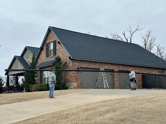 Our team adding new gutters