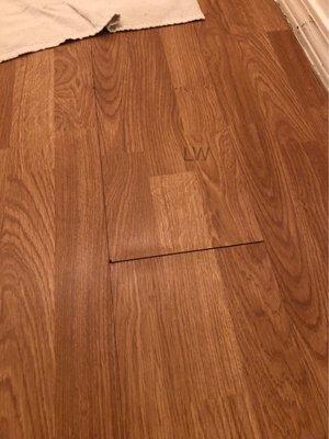 Water damage to hallway floor