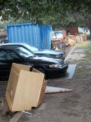 Newly renovated with gross cabinets stored outside in the rain.