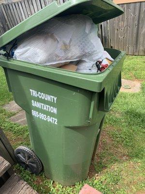 Taken one day after my trash was supposed to be emptied. Was told by the office manager that customers often fill up trash cans afterwards.