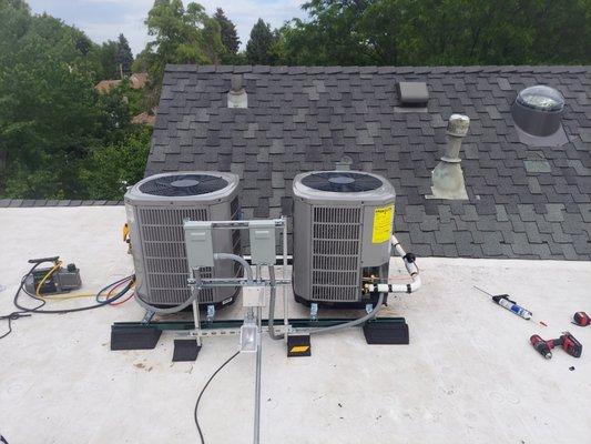 American Standard 2 ton AC rooftop installation in Aurora. 14 SEER.