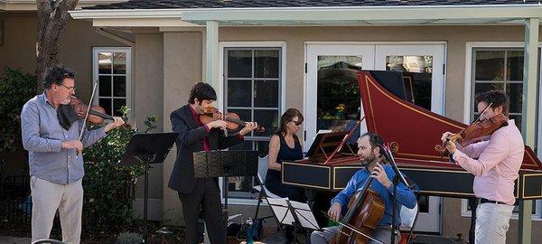 Phillip Joubert and Isaac Allen, violinists, with Alison Luedecke on harpsichord, Alex Greenbaum on cello, and Andrew Waid on viola.