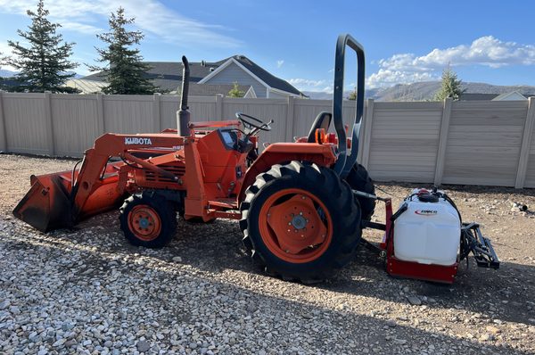 Heavy tractor and sprayer.