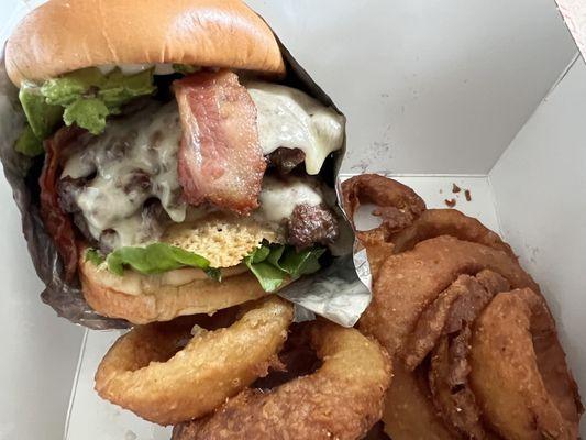 My burger and couple onion rings. 3 of the onion rings were so well done I gave them to my dog.