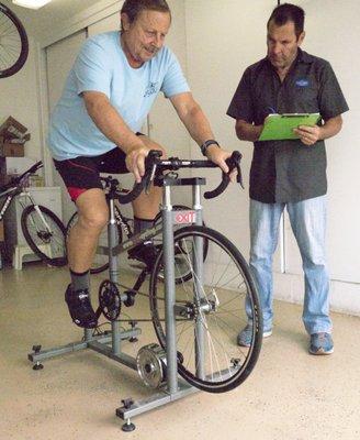 Mike putting me through the paces, checking different adjustments for comfort and power.