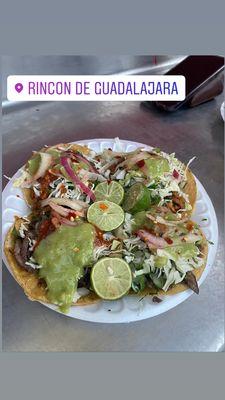 Al pastor and carne asada tacos with all the good toppings