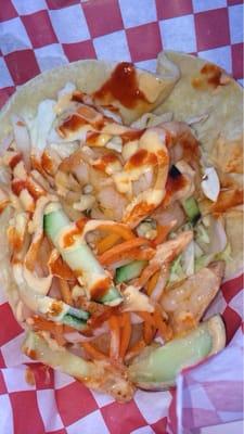 Grilled shrimp taco with sriracha sauce from 3 Brothers Kitchen