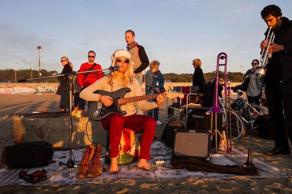 Playing at Ocean beach in San Francisco for a group with Local Soul Adventures