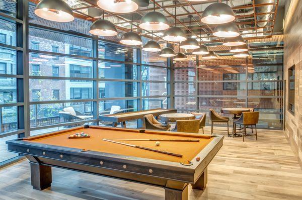 Game Room with Shuffleboard and Pool Table