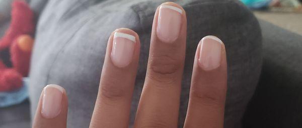 Uneven and rushed French manicure over $100.