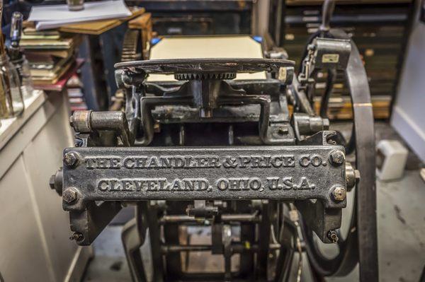 A vintage printing press at Bremelo Press. Photo by Noah Fecks.