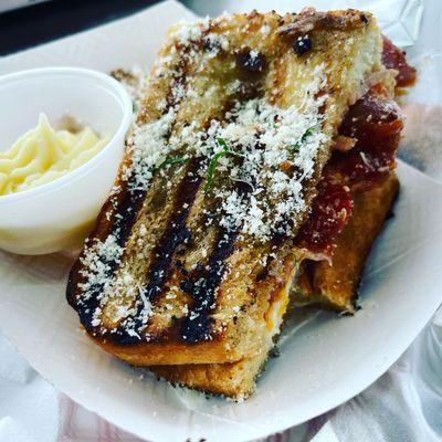 Our signature grilled cheese with candied bacon and whiskey tomato jam.