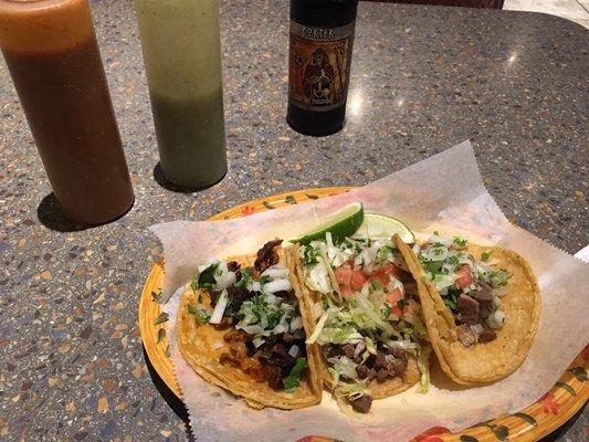 Awesome tacos de al pastor, lengua, y carne asada. Una cerveza, tambien.