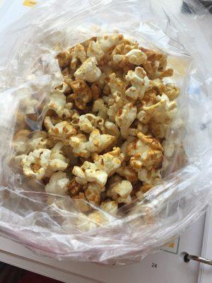 Delicious caramel popcorn - made in-house and yummy!! Only 75 cents per bag! Get it!