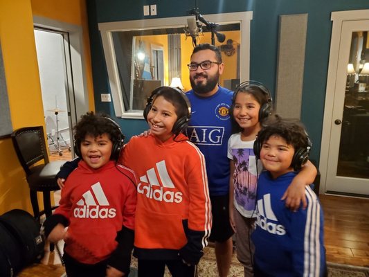 Recording Engineer of Sinai taking a photo with the kids after the studio session on Tuesday 9/15/20