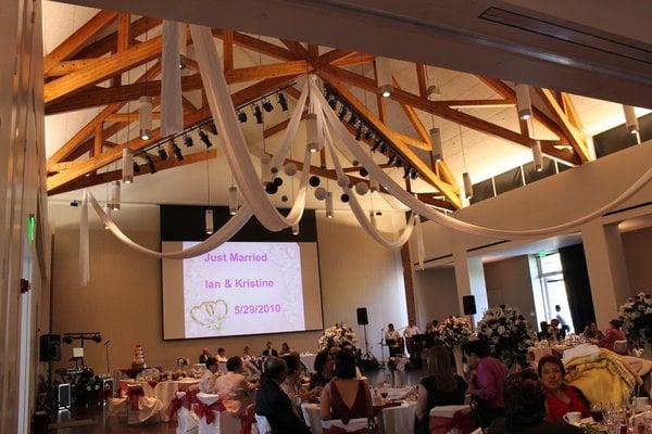 The exposed beams in the Grand Ballroom create the high-end modern aesthetic of the room, but they can also be used to hang event decor.