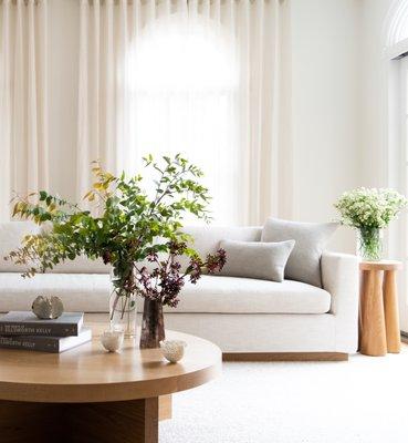 Living Room in a soft palette with a custom 13' sectional sofa in a family-friendly performance linen.