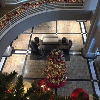 Looking down onto the lobby/ground level. It's airy inside with loads of glass walls to let in light 1/4/21