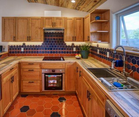 A tile backsplash makes every kitchen more exciting to use. And easier to clean!