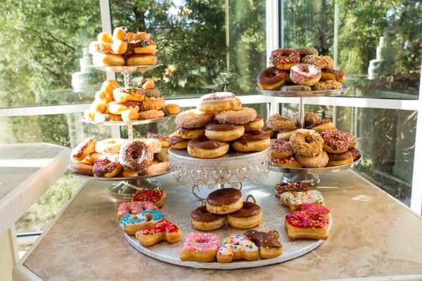 Jenny went and bought donuts for my wedding (they say best day ever at the base) and arranged them on stands for me!