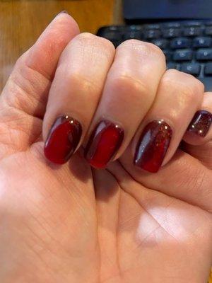 Color changing from deep red when warm to a dark burgundy when cold