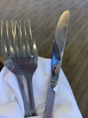 Dirty utensils! Waiter for our waiter to come back and he didn't