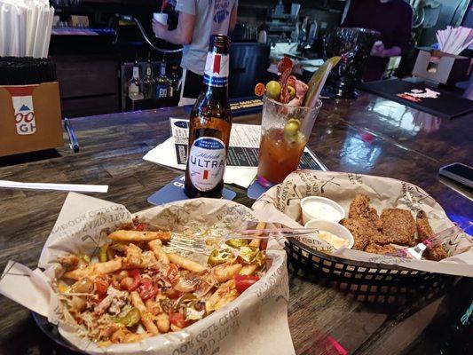 Loaded French fries and fried Portobella shrooms which are .  Bloody Mary with Ham,Bacon ,olives ,and a big Ole pickle strip....