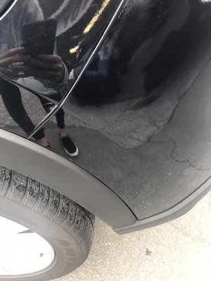 A scratch still on my car after paying over $700 to have it fixed