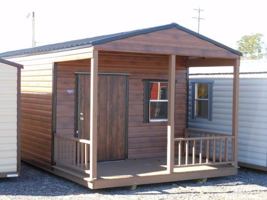 This is a "Porch" option on our big 12 x 36 Cedar Brown - Aluminum sided - Premier Series.  What a great building!