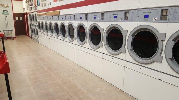 They have 18, thirty-pound dryers. It's .25 for 7 minutes. Typically, a dollar will get a load dry. Dryers are cleaned each night.