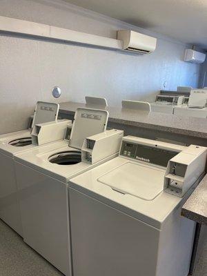 Washing machines in one half of the place