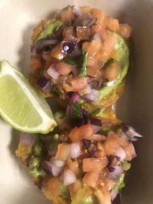 Tostones with guacamole and pico de gallo