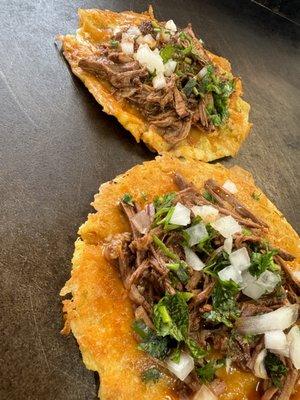 Barbacoa tacos w/ cheese