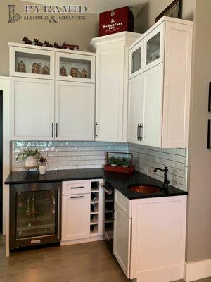 Wet bar done in brushed granite