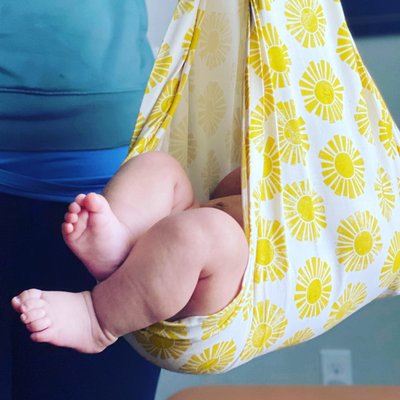 Weighing a healthy chunky baby at 6 weeks old.