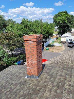 Chimney rebuild from roofline up.