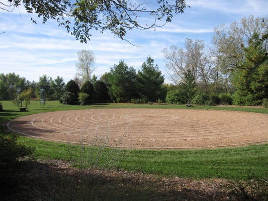 Our Outdoor Labyrinth is nestled in the center of our Outdoor Prayer Garden and is located about 100 yards next to church.