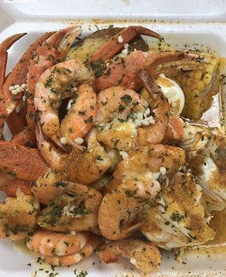 Mild snow crab combo comes with shrimp egg corn and potatoes