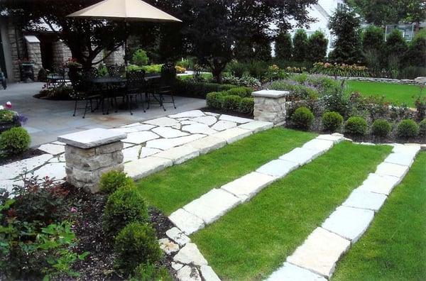 Outdoor stonework, entertainment area and recreation garden by Daniels Landscaping