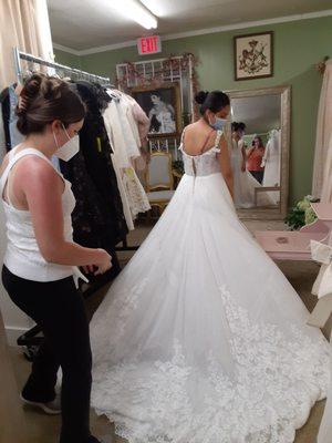 My daughter-in-law to be trying on two different dresses and the lady was so helpful