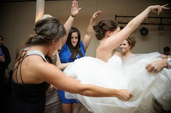 Everybody's hands go up at Matt and Jacylyn's Wedding in Rochester, MN.