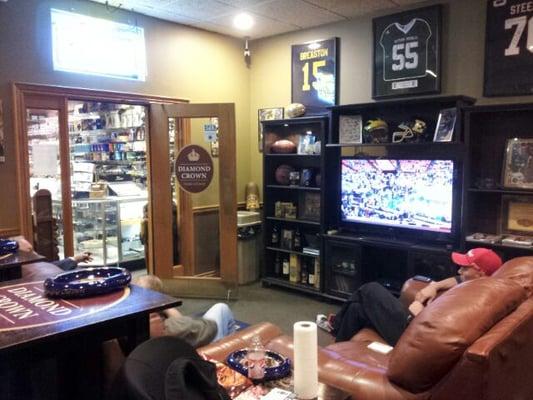 watch the game and enjoy the cigar in back room