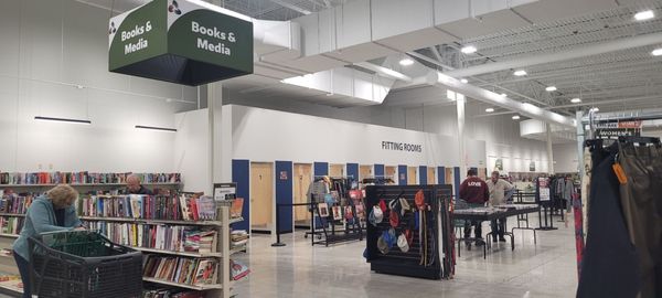 Books and media / fitting rooms in background