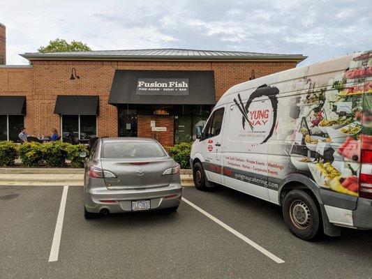 Outside Fusion Fish at Meadowmont Village. I took this storefront picture on August 14, 2020. This space is now occupied by Lime & Lemon.